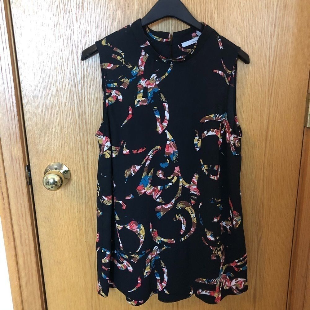 Halogen sleeveless top